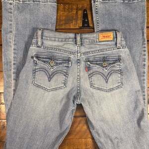 Vintage Y2K Levi's 524 Too Superlow Bootcut jeans with flap pockets Size 1